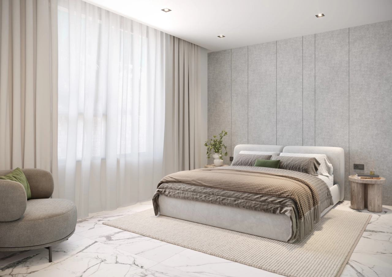 Ett lugnt och rymligt sovrum designat för högsta komfort och avkoppling.