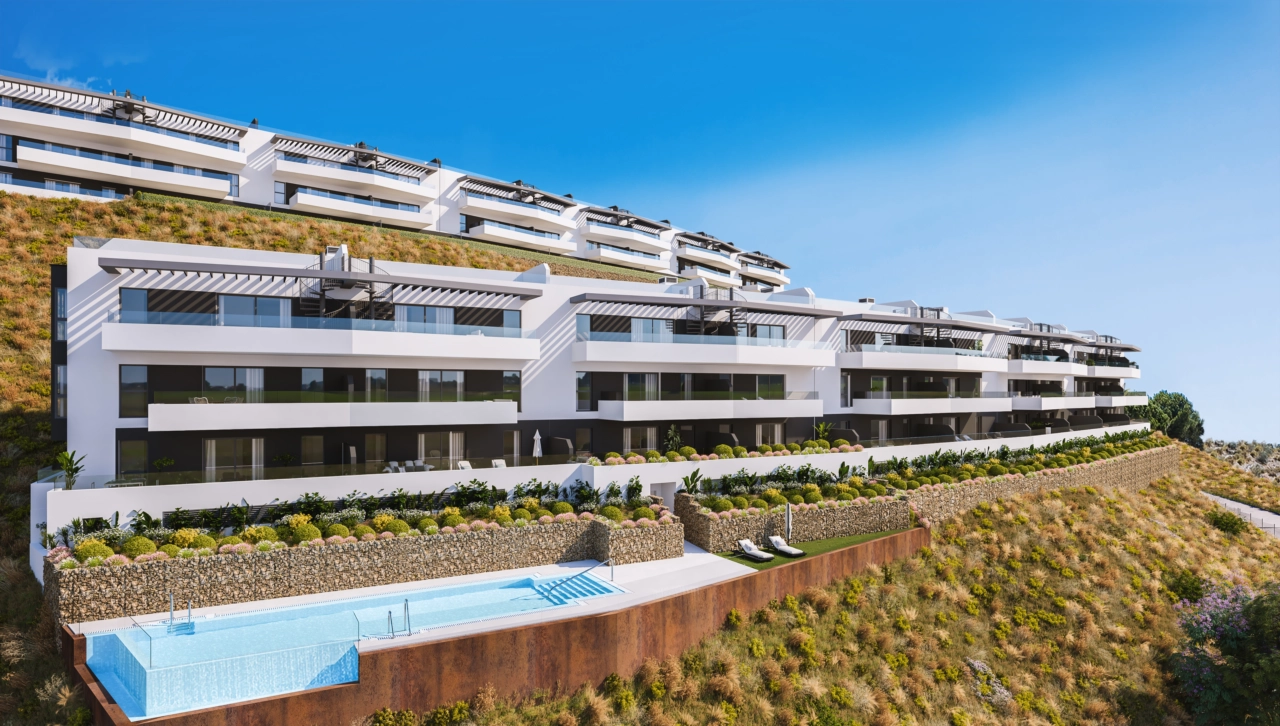 En vy över det stilfulla lägenhetskomplexet, designat för att smälta in i det naturliga landskapet.