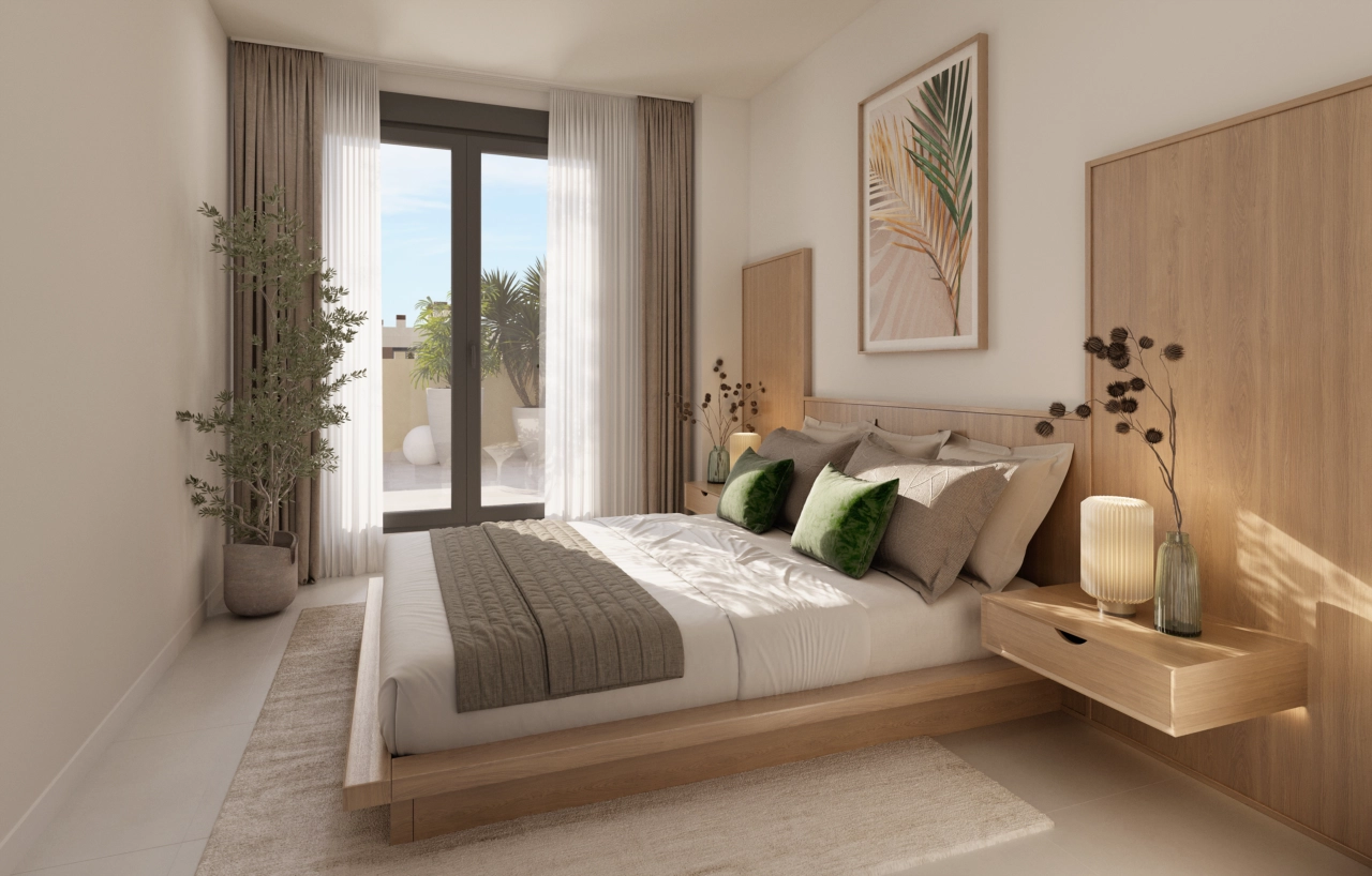 Huvudsovrummet är en lugn oas som erbjuder komfort, stil och direkt tillgång till en privat terrass.