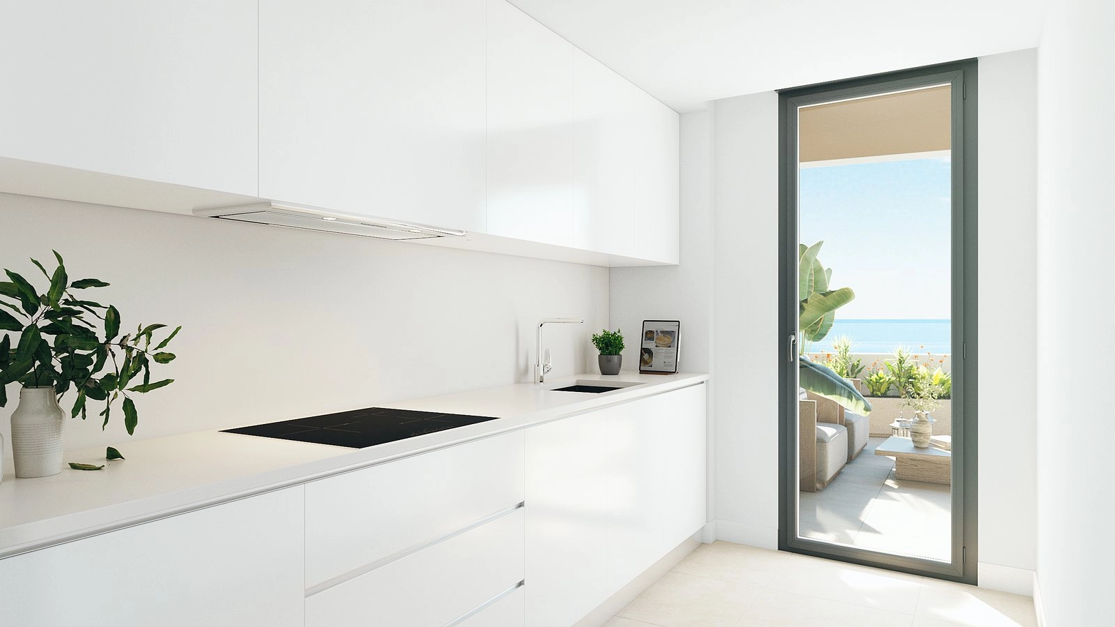 Ett ljust, modernt kök utrustat med exklusiva vitvaror, med utgång till terrassen för en livsstil som sömlöst kopplar samman inne och ute.