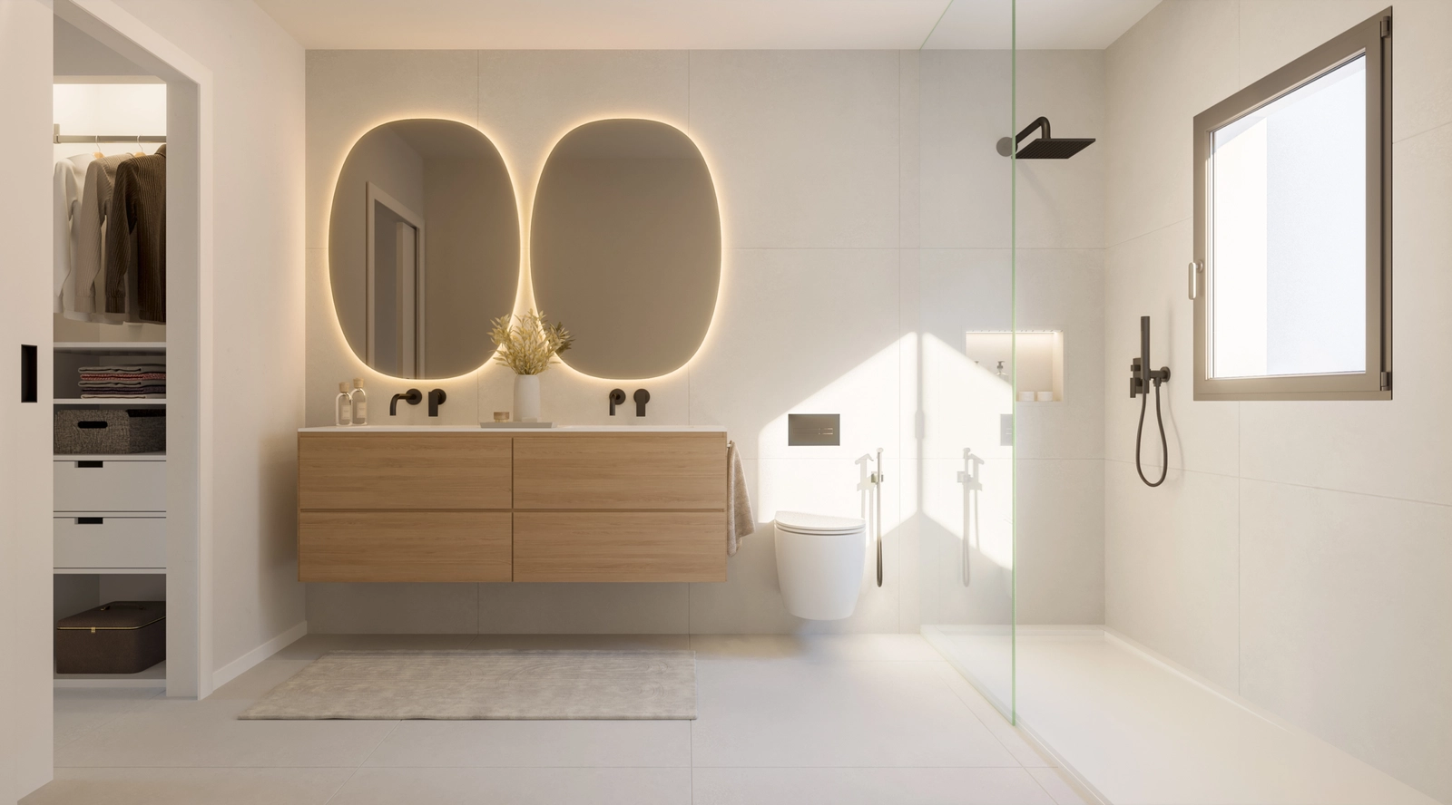 Ett ljust och modernt badrum med högkvalitativa armaturer och en rymlig dusch.