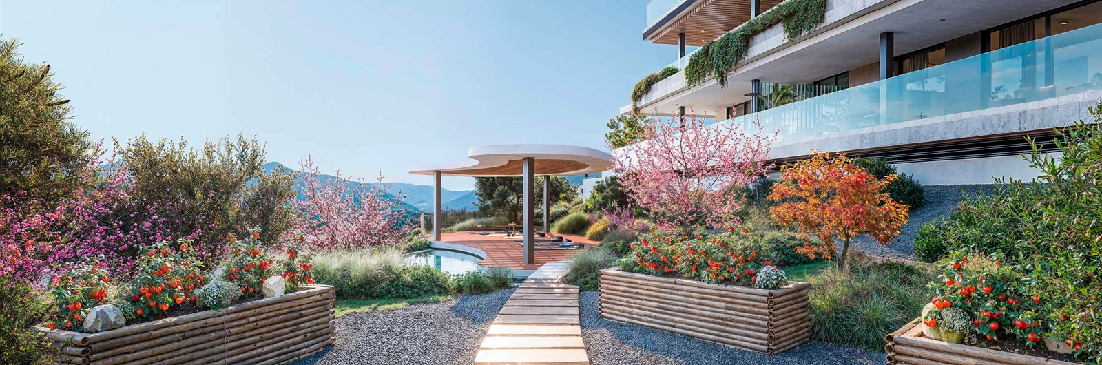 Vackert anlagda medelhavsträdgårdar skapar en fridfull miljö för de boende att njuta av.