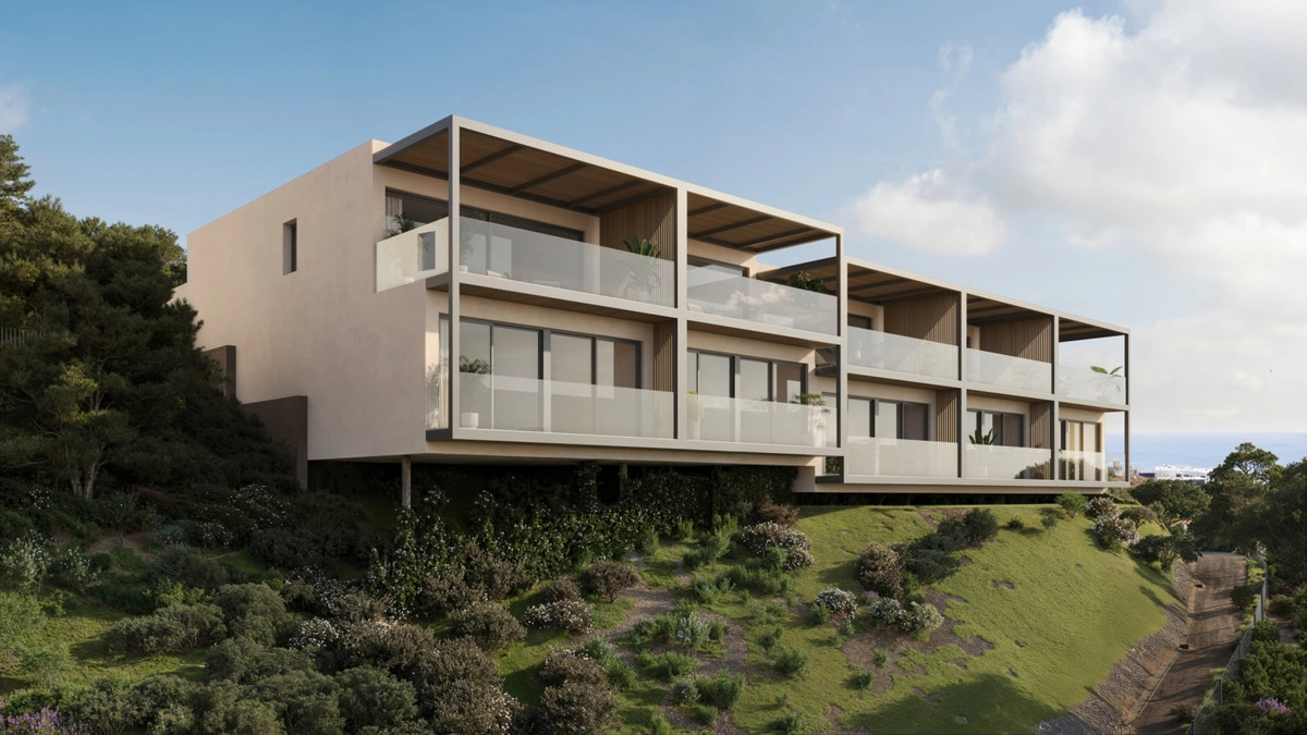 Modern arkitektur designad för att harmoniskt smälta in i det naturliga landskapet.