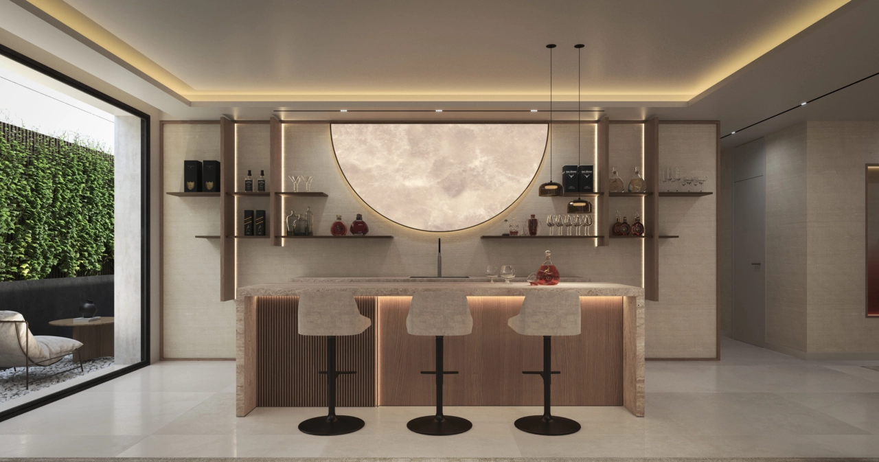 Ett stilfullt bar- och loungeområde i källaren erbjuder en sofistikerad plats för att underhålla vänner och familj.