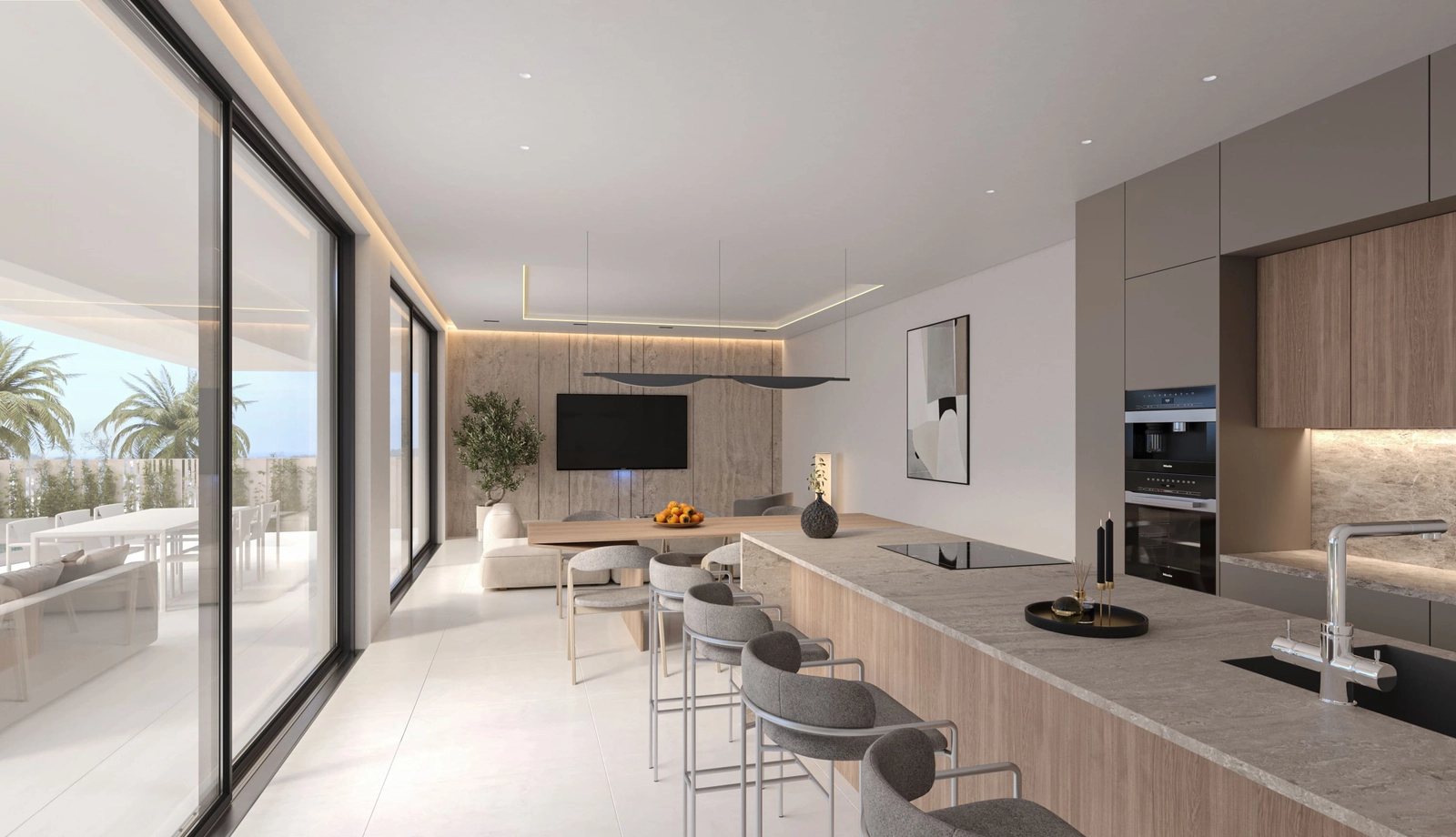 Ett modernt, fullt utrustat kök med en stilren köksö är idealiskt för matlagning och umgänge.