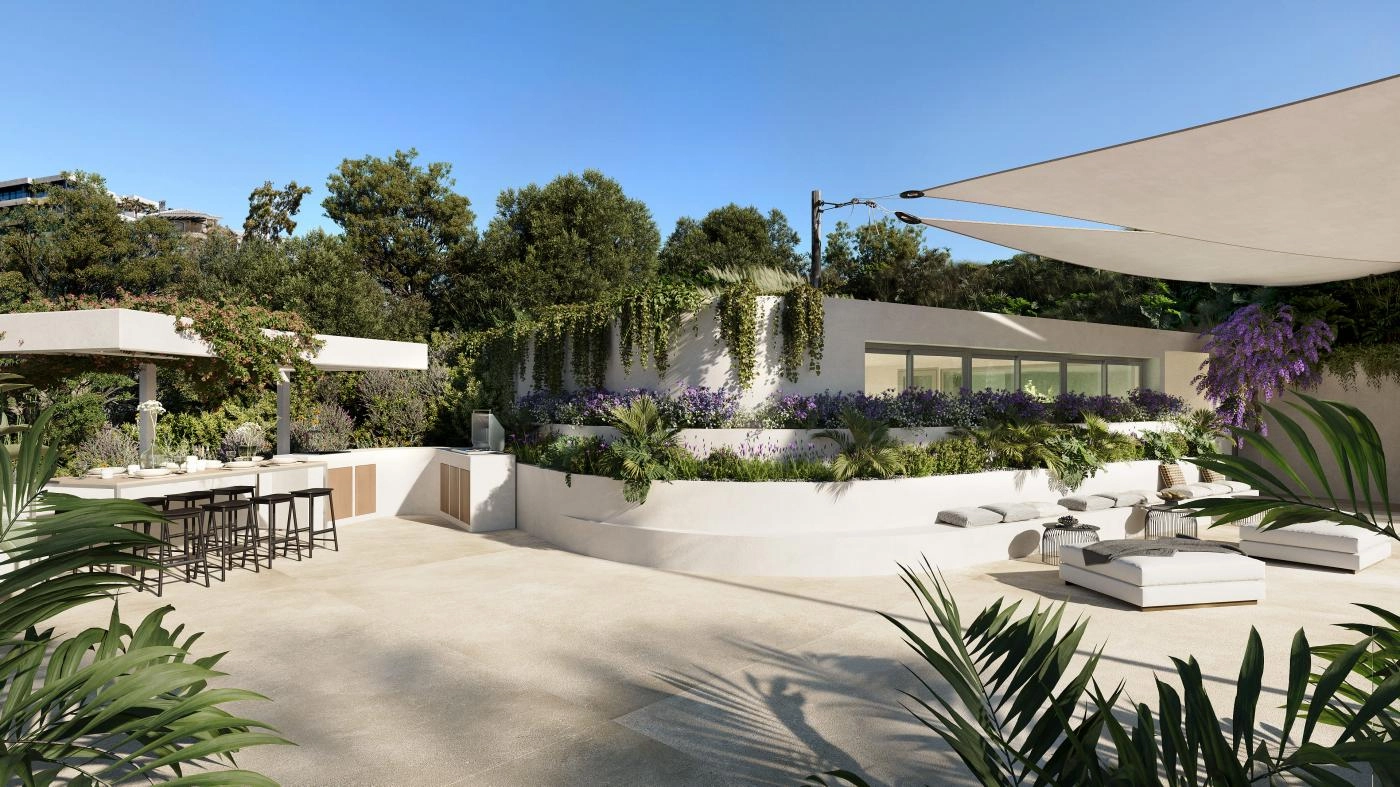 En utomhuslounge och ett kök med grillplats, perfekt för sociala sammankomster och middagar utomhus.