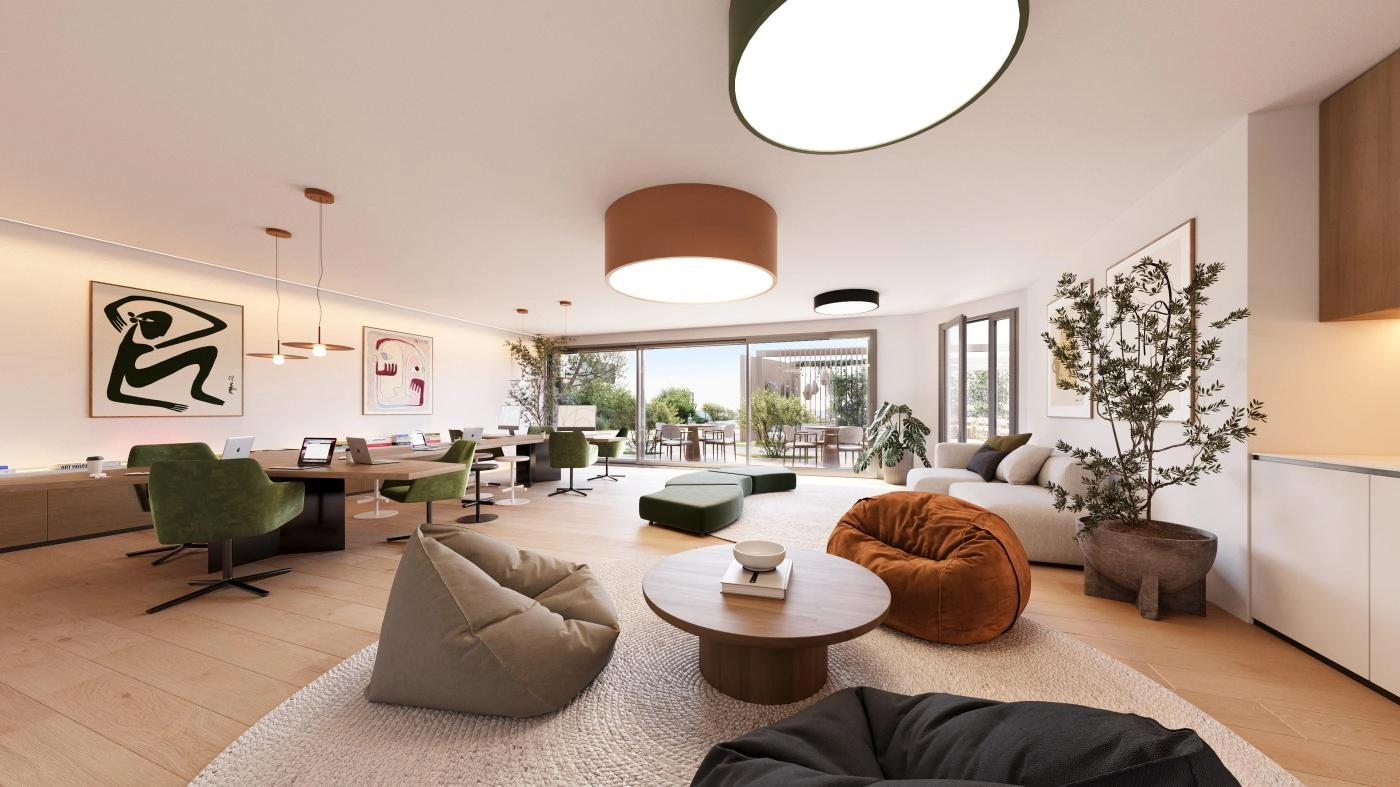 En mångsidig och stilren co-working- och social lounge där boende kan arbeta, träffas eller koppla av bekvämt.