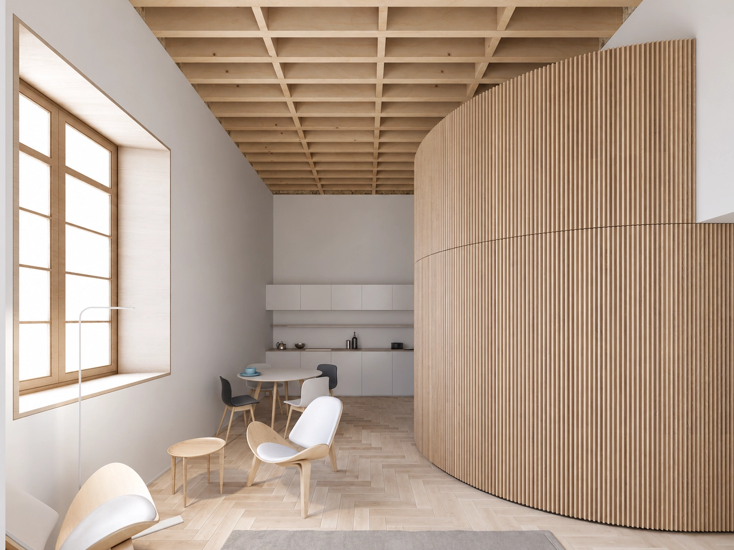 En vy över den sömlösa integrationen mellan kök och matplats, med ren design och naturligt trä.