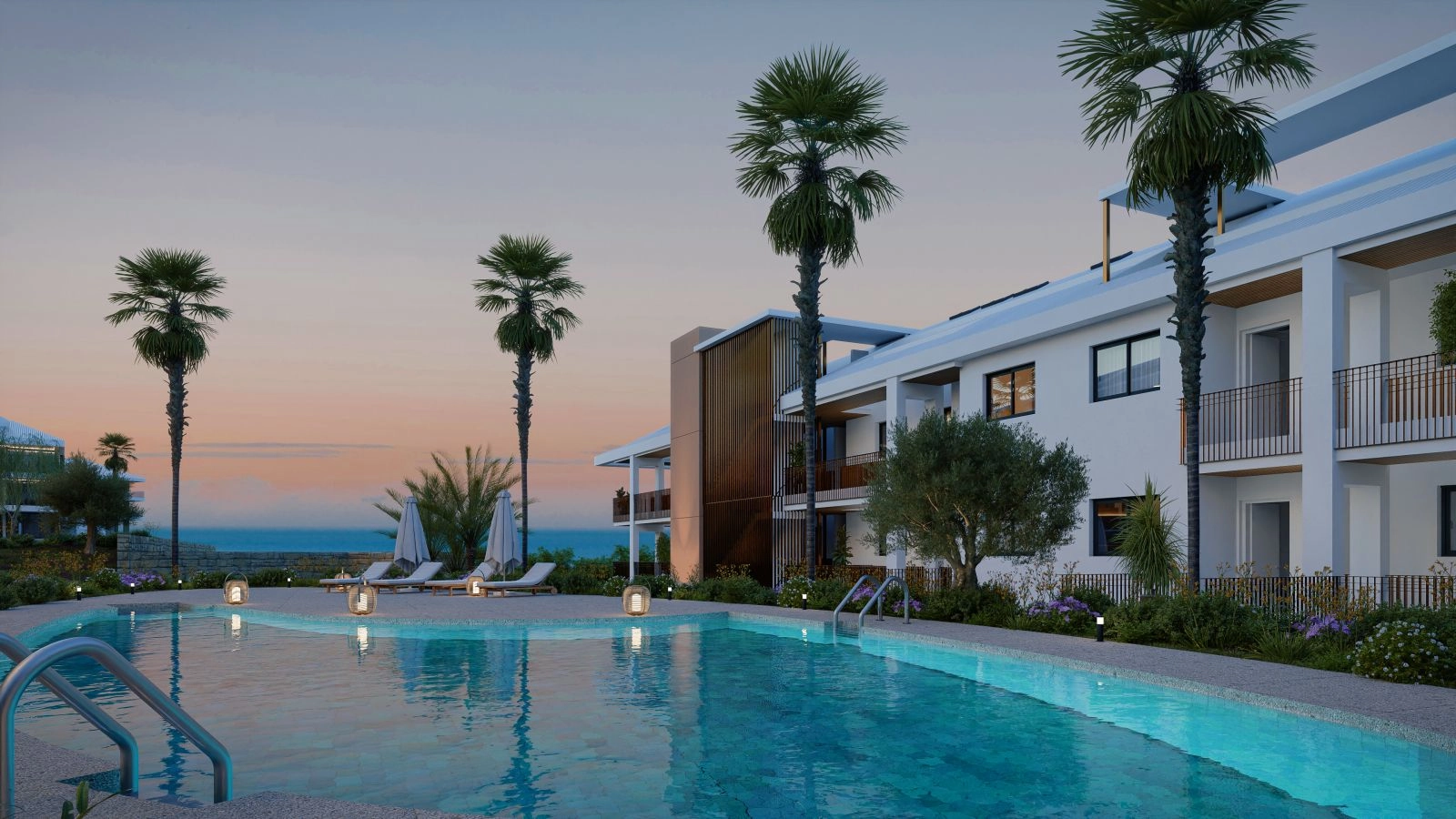 Det gemensamma poolområdet i skymningen, en perfekt plats att koppla av och njuta av solnedgången.