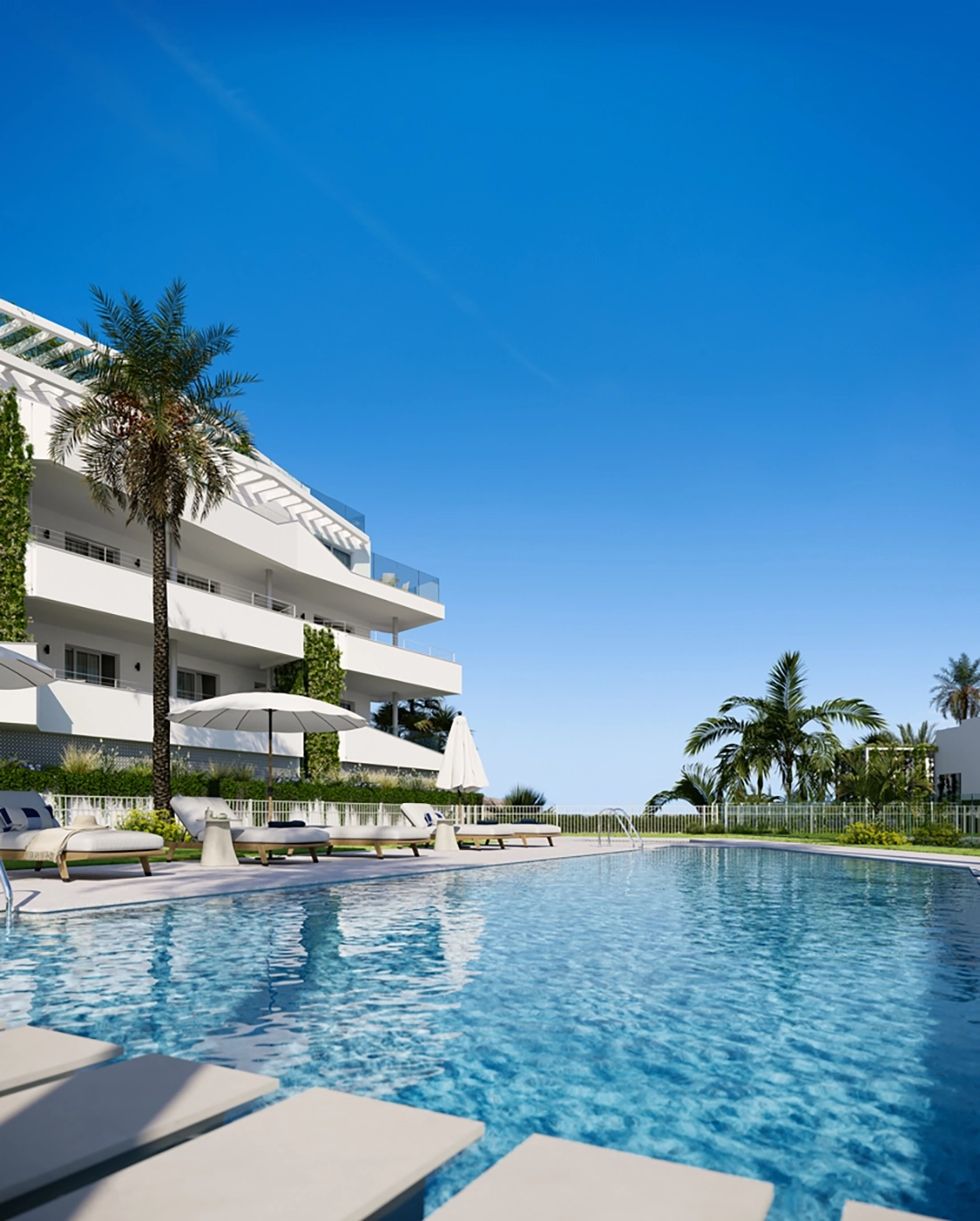 Bostädernas poolområde erbjuder en fridfull tillflyktsort med fantastisk utsikt över Medelhavet.