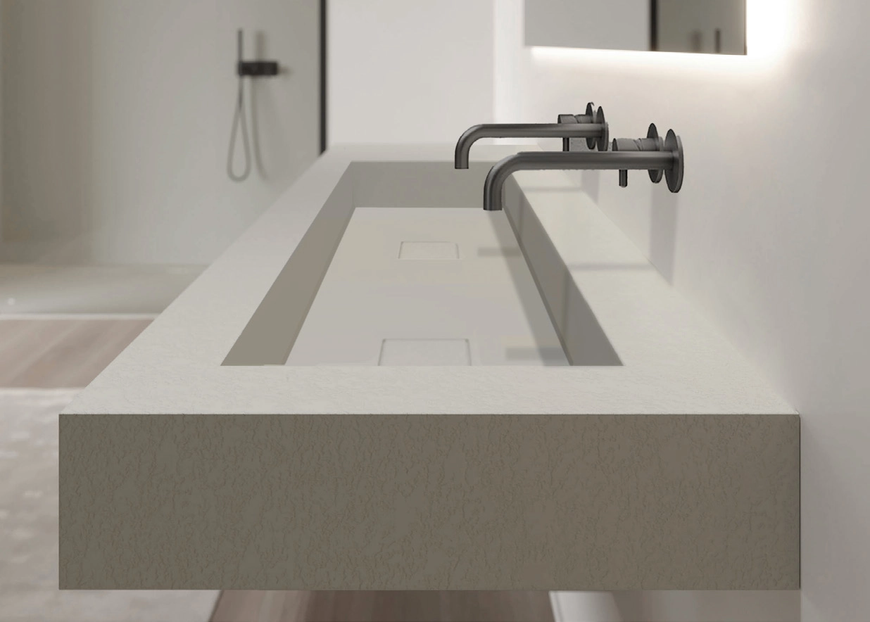 Masterbadrummet har en modern dubbelkommod och högkvalitativa ytskikt.