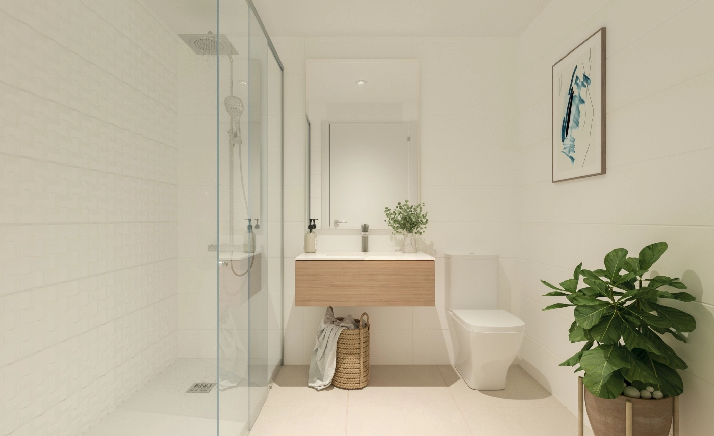 Ett stilrent och modernt badrum med högkvalitativa material och ytbehandlingar.