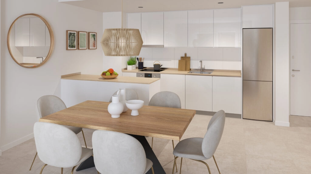 Ett modernt kök med öppen planlösning, fullt utrustat med vitvaror av hög kvalitet, designat för både vardagsliv och underhållning.