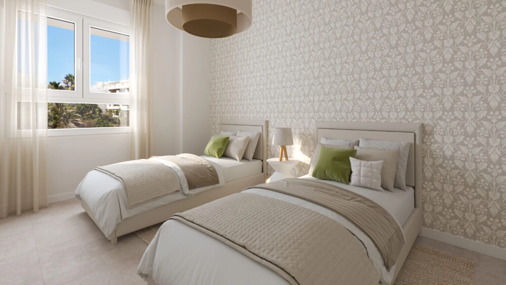 Ett bekvämt och inbjudande gästsovrum, omsorgsfullt designat för vila och avkoppling.