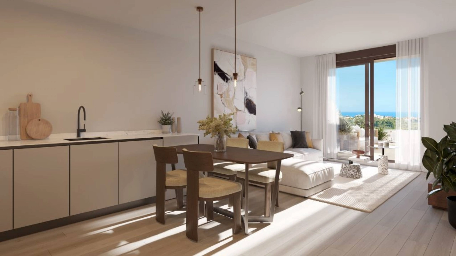 En öppen planlösning med kök och matplats, perfekt för att underhålla gäster eller njuta av lugna familjemiddagar.