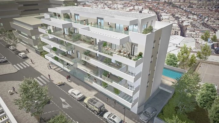 En överblick över projektet, som framhäver dess moderna arkitektur och gemensamma poolområde.