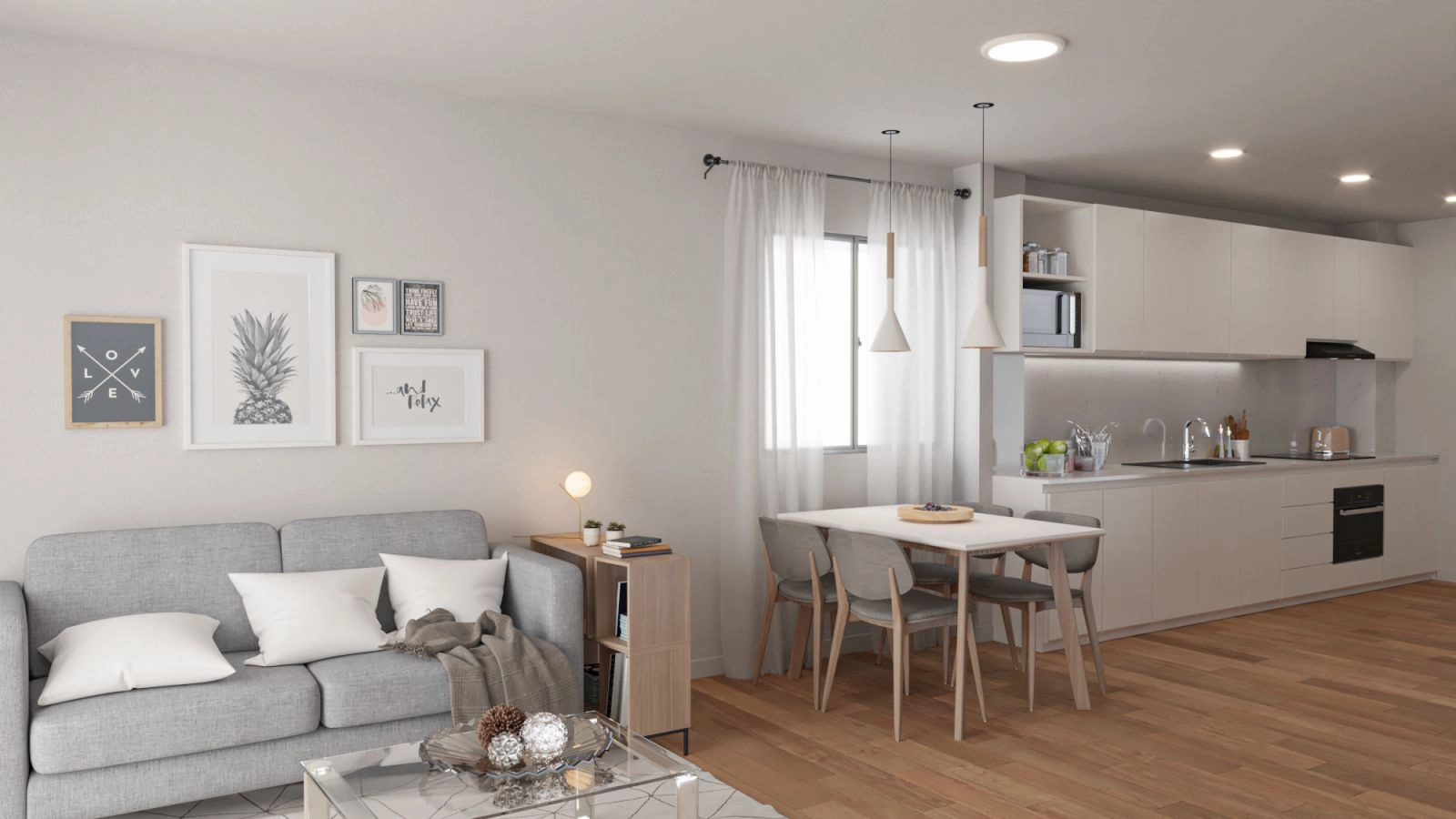 Det ljusa och rymliga vardagsrummet är designat för komfort och flyter sömlöst in i det moderna köket.