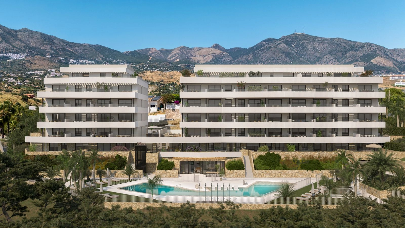 Bostadens eleganta moderna fasad, belägen mot den dramatiska bakgrunden av de andalusiska bergen.