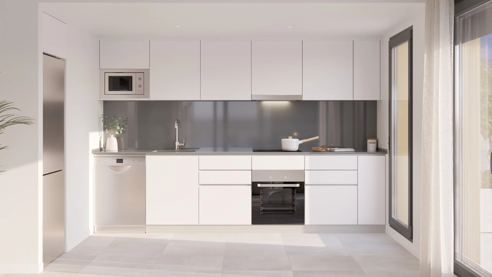 Det fullt utrustade köket har en elegant, minimalistisk design med högkvalitativa vitvaror.