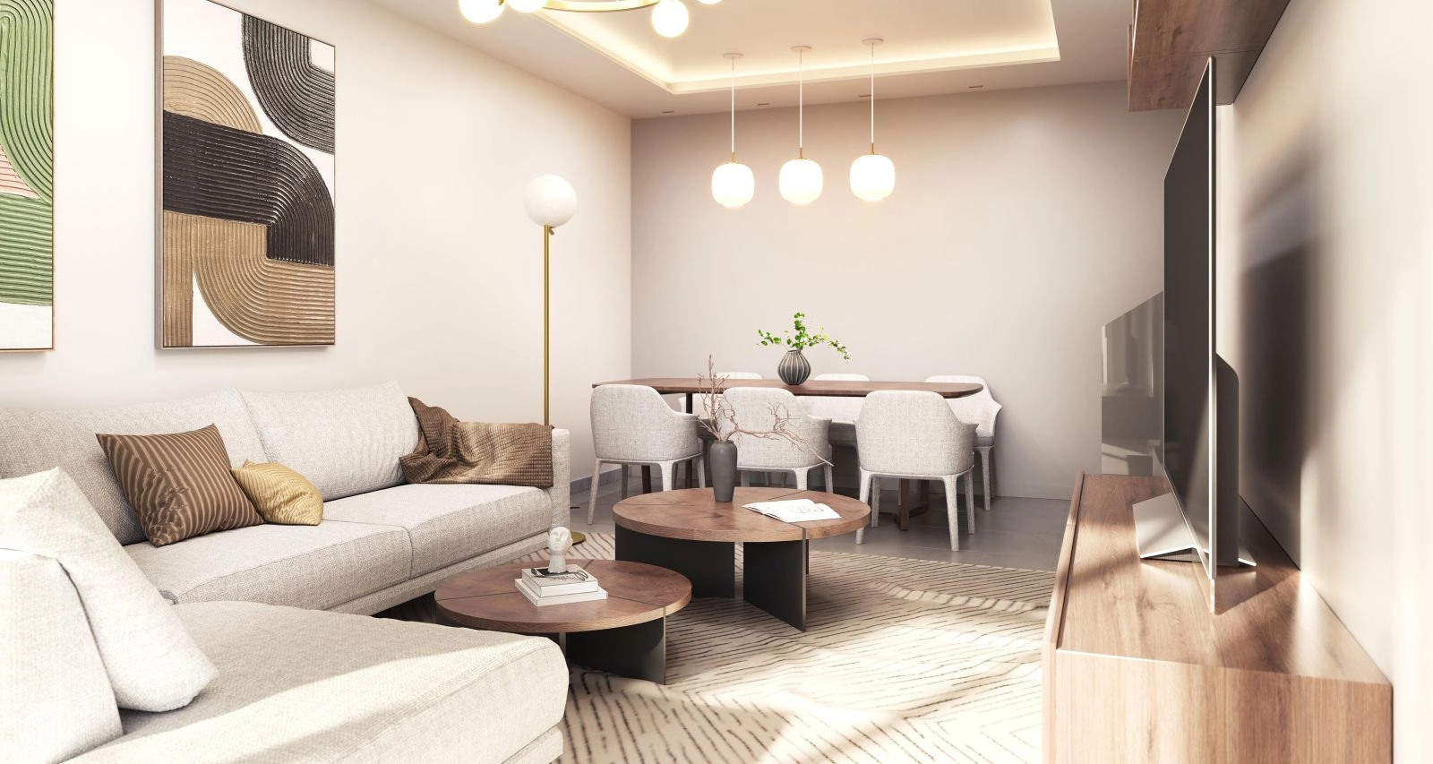 Vardagsrummet är designat för komfort, fyllt med naturligt ljus och modern elegans.