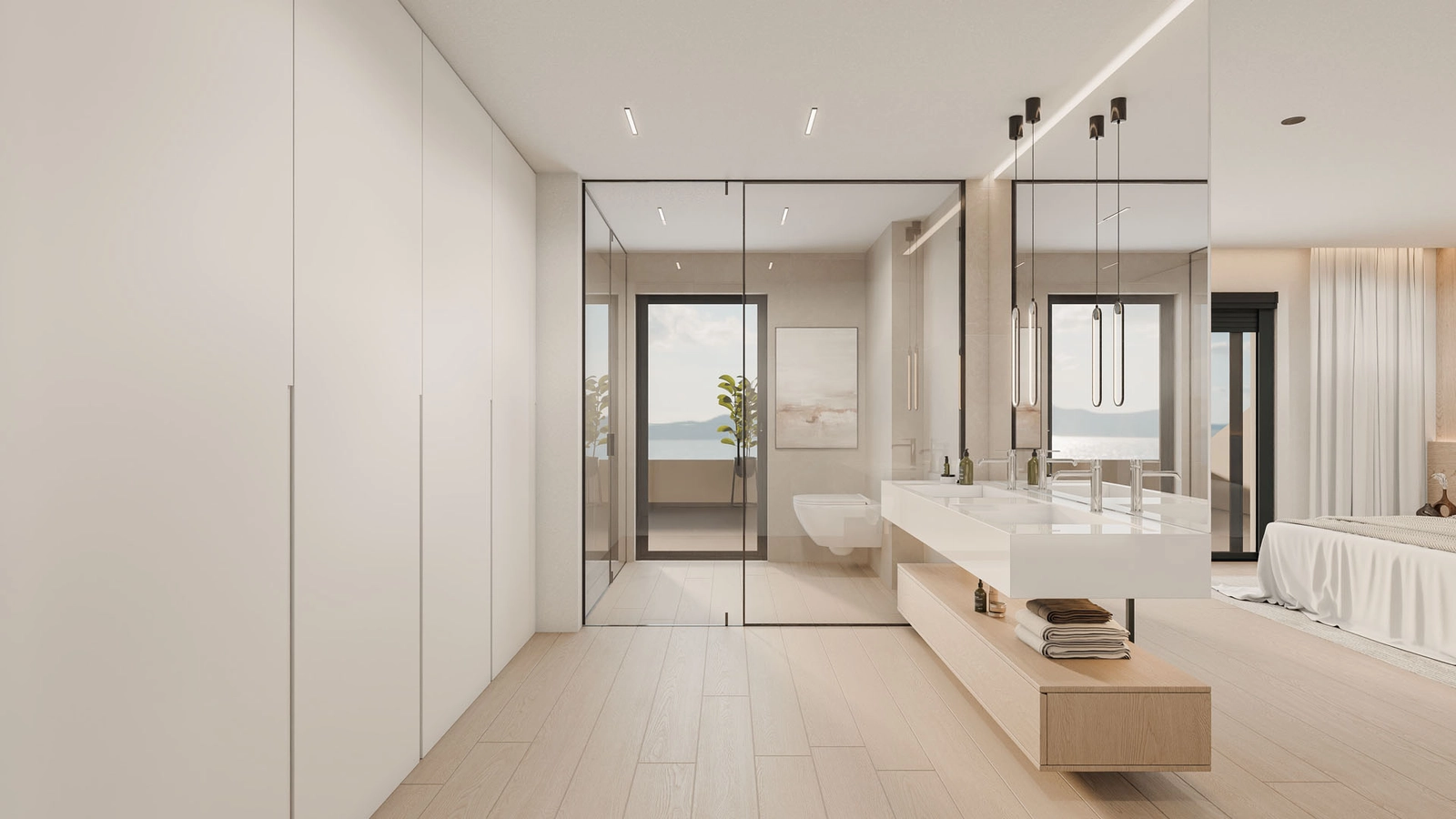 Ett lyxigt badrum en-suite där rena linjer och naturligt ljus skapar en spa-liknande atmosfär.