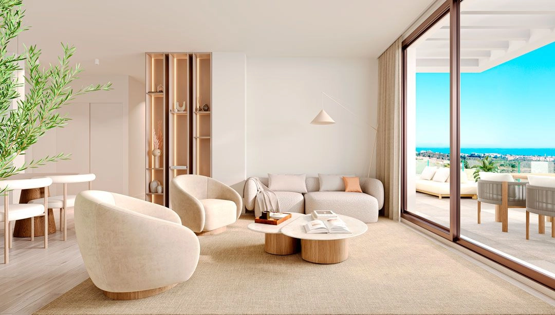 Ett ljust och luftigt vardagsrum designat för komfort, med direkt utgång till den privata terrassen.