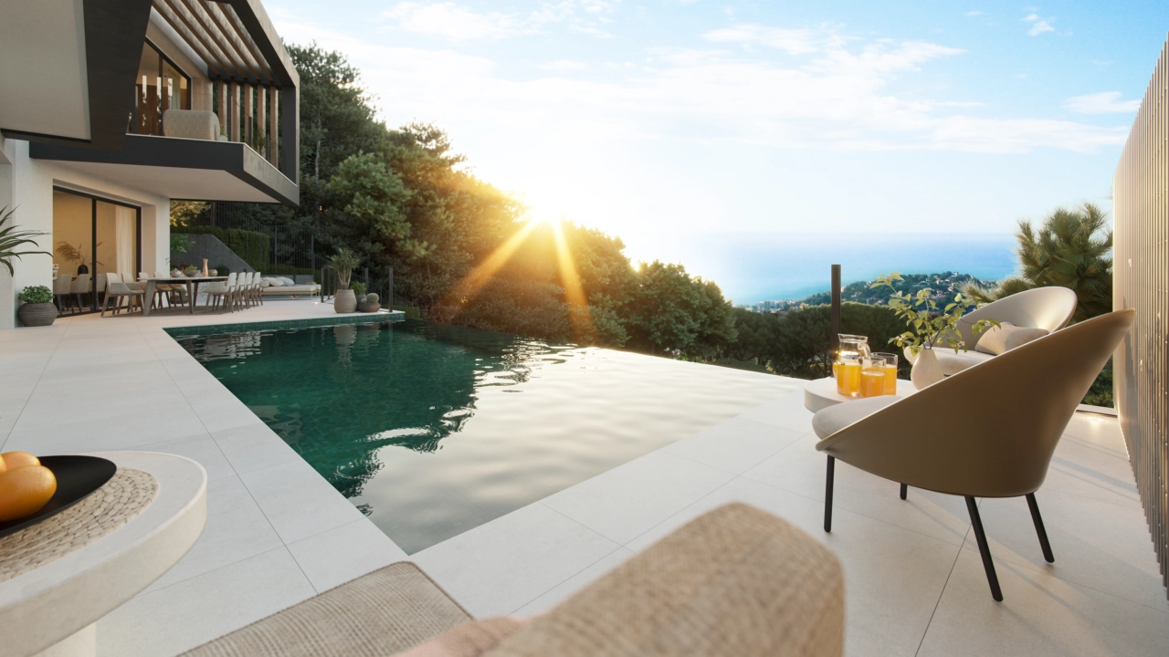 Koppla av vid poolen och se solen gå ner över Málagas vackra kullar.