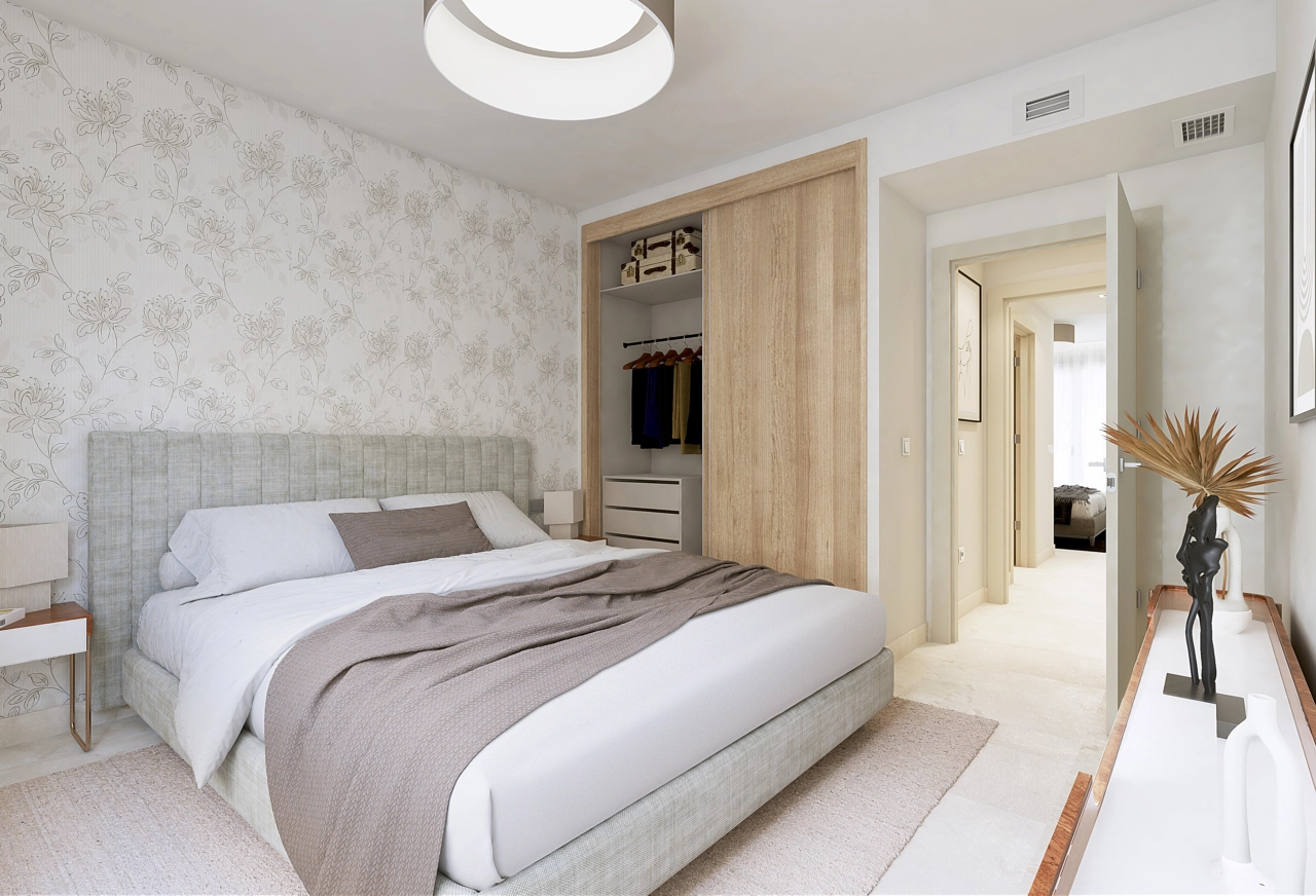 Master sovrummet erbjuder en lugn tillflyktsort med gott om förvaring och sofistikerade designdetaljer.