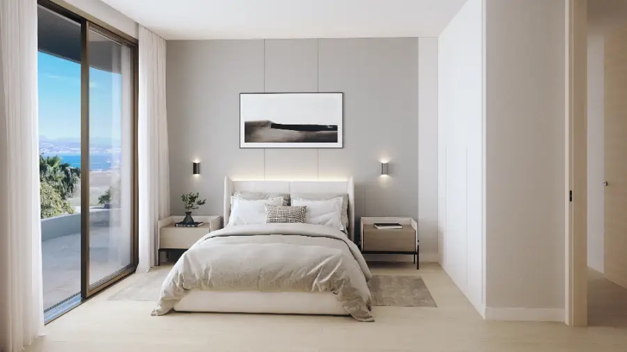 Ett andra välutrustat sovrum som erbjuder komfort, stil och vacker utsikt.