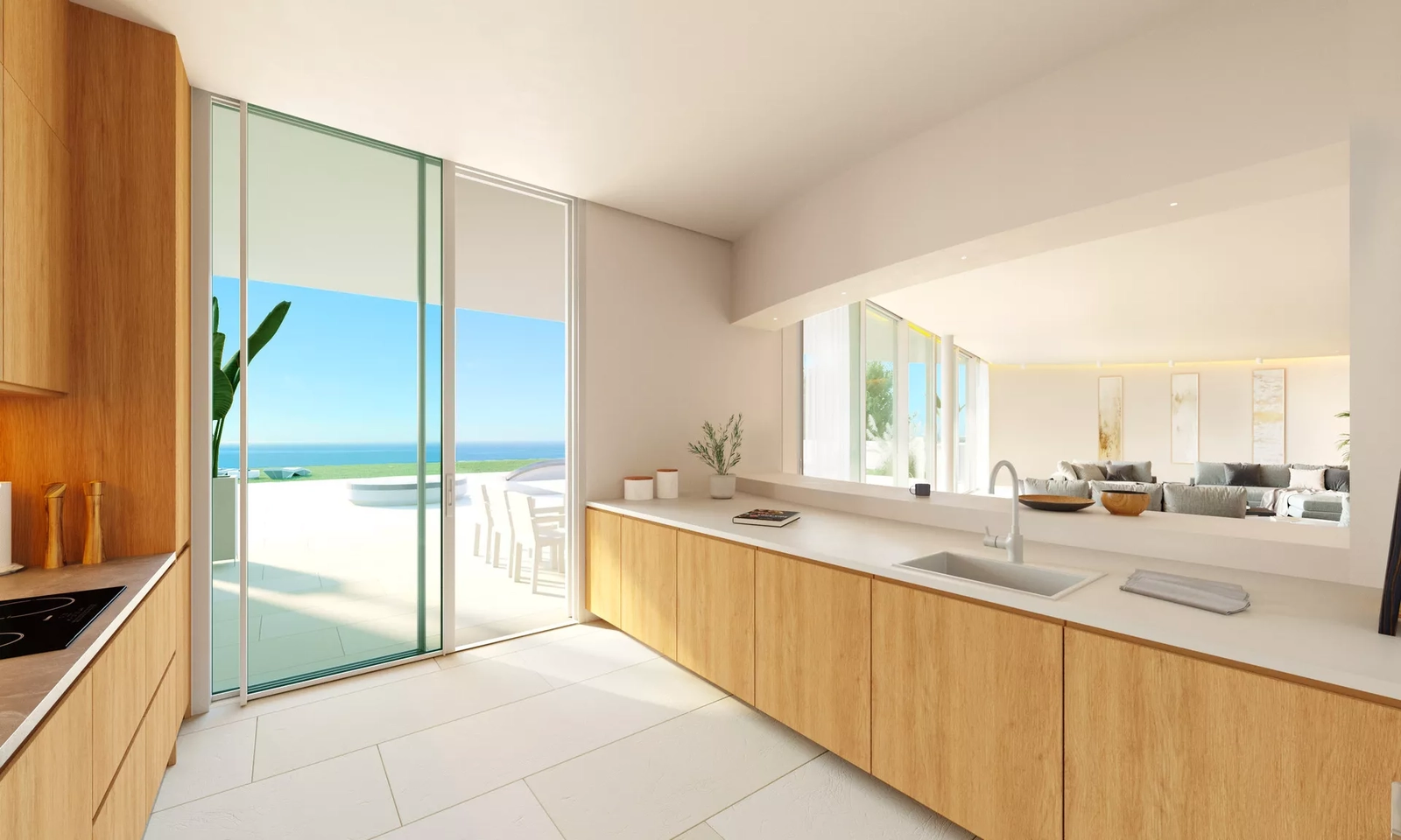 Ett modernt, fullt utrustat kök med rena linjer och naturmaterial, som ansluter till de huvudsakliga sällskapsytorna.