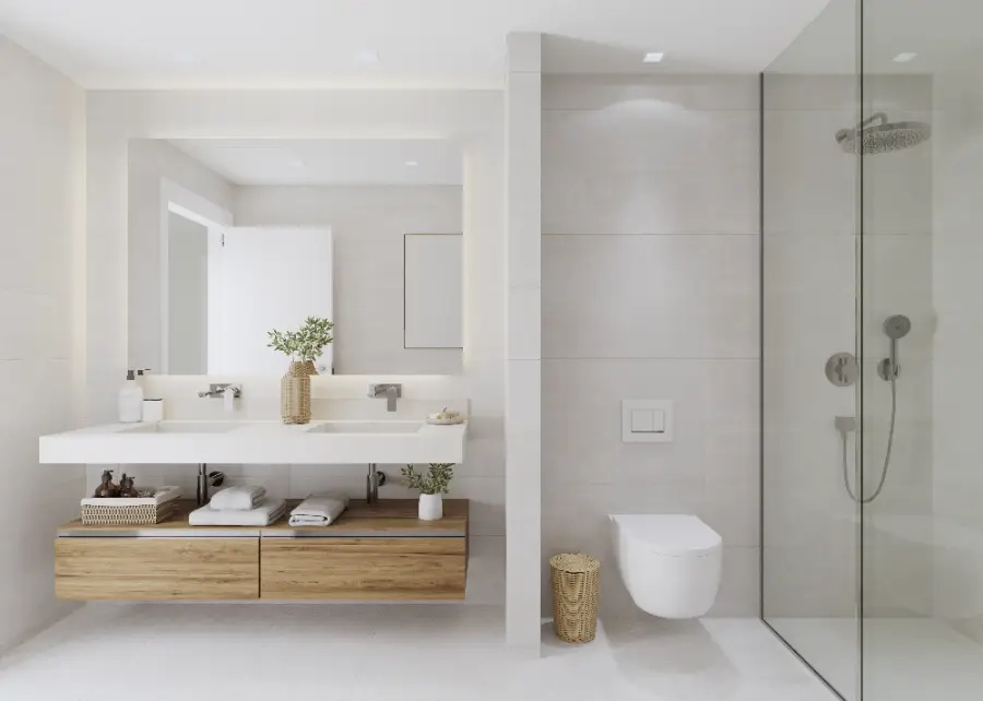 Ett stilrent huvudbadrum med högkvalitativa ytskikt, dubbelkommod och en rymlig walk-in-dusch.