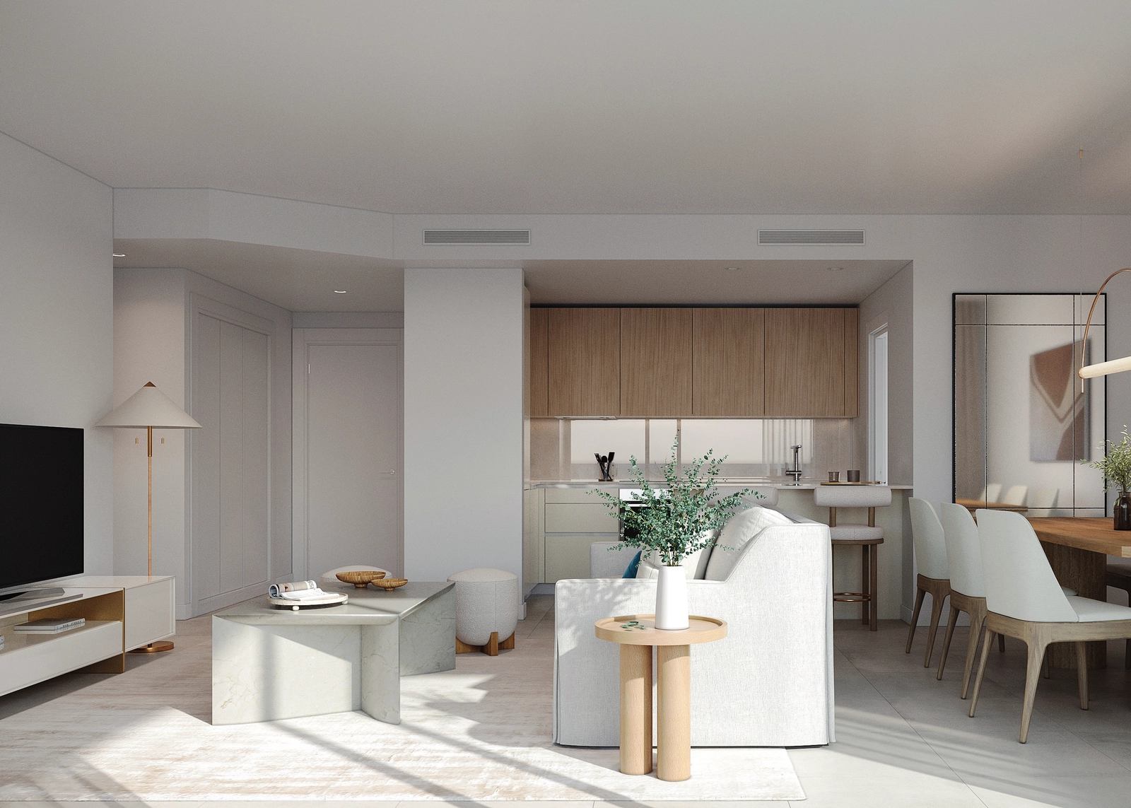 Ljusa och öppna vardagsrum som flyter sömlöst, fyllda med naturligt ljus.