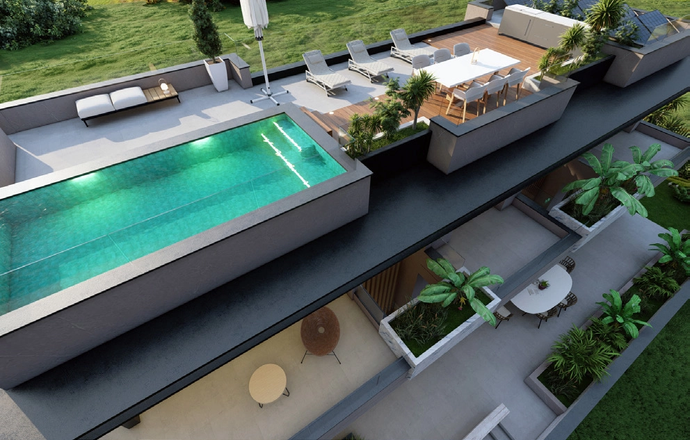 Taksolariumet har ytterligare en pool och gott om utrymme för middagar, underhållning eller bara avkoppling i solen.